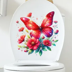 Detailed view of vibrant red butterfly and floral waterproof decal on a toilet lid