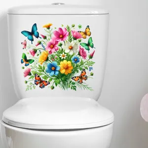 Detailed view of colorful floral and butterfly waterproof decal on a white toilet