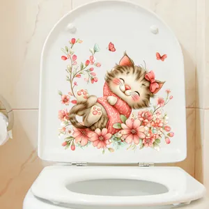 Detailed view of a cute cartoon cat and flower waterproof sticker on a toilet lid