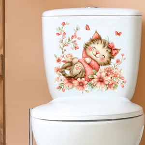 Detail of cute cat and pink floral sticker applied on a white toilet tank