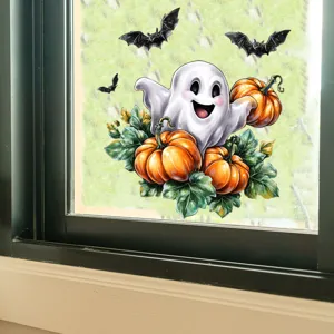 Vue détaillée d'un autocollant d'Halloween avec fantôme et citrouilles sur une vitre