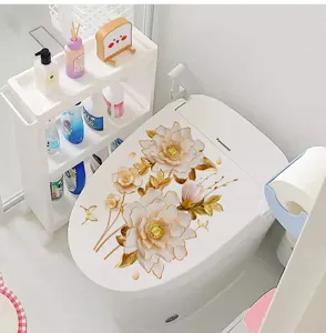 Detailed view of elegant 3D golden floral self-adhesive sticker on white toilet lid