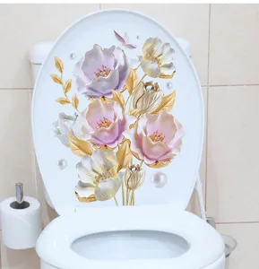 Detailed view of elegant 3D floral decorative sticker applied on a white toilet lid