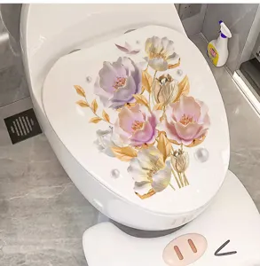 Detail of 3D floral toilet lid sticker featuring elegant purple and pink flowers with gold leaves