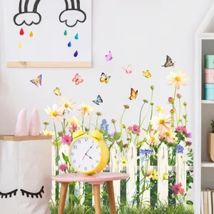 Muursticker tuinhek met bloemen en vlinders detailweergave
