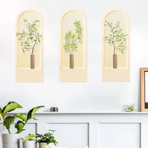 High-definition detail view of three simulated green plant wall stickers in minimalist arched frames