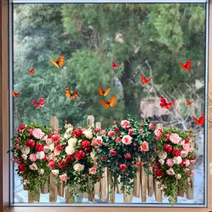 Detailansicht von Rosen- und Schmetterlings-Fensteraufklebern für die Schaufensterdekoration