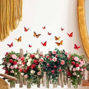 Detailed view of 3D rose flower and butterfly wall stickers on a home interior wall