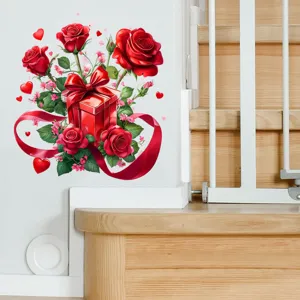 Adesivo murale romantico con rose rosse e scatola regalo su parete bianca vicino alle scale