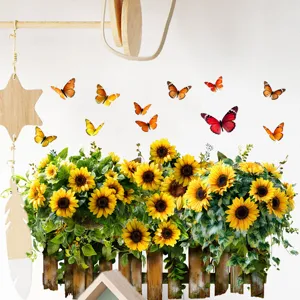 Detailed view of vibrant sunflower and butterfly fence wall sticker on a white wall