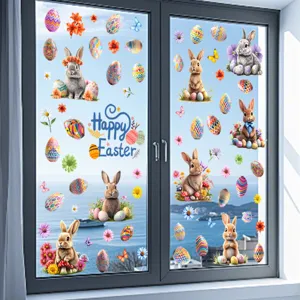 Detail view of Easter bunny and colorful egg static cling decals on glass window