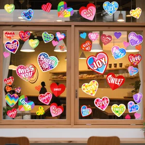 Colorful heart-shaped static window clings with English text on a bakery window