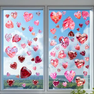 Colorful diamond heart static cling window decals applied to a glass window pane