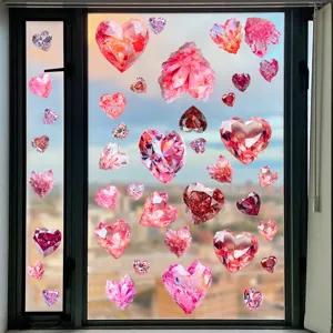 Detail of 3D diamond texture pink heart window stickers applied on clear glass pane.