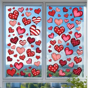 Assorted red heart static cling window stickers featuring dots, stripes, and plaid patterns