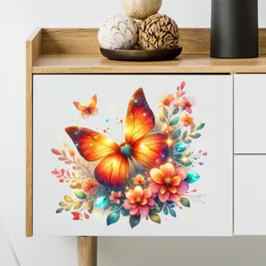 Detailed view of a vibrant butterfly and floral decal on a white cabinet door.