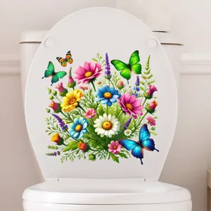 Close-up of vibrant floral and butterfly waterproof sticker applied on a white toilet lid