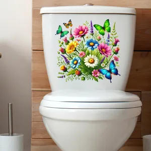 Detailed view of waterproof floral and butterfly toilet sticker on a white tank