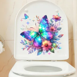 Vibrant butterfly and floral waterproof decal applied to a white toilet seat lid