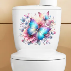 Close-up of vibrant butterfly and floral waterproof decal on a white ceramic toilet tank