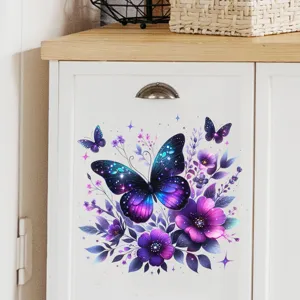 Vibrant purple butterfly and floral wall sticker applied to a white cabinet door.