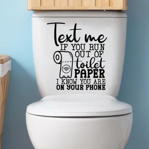 Close-up of funny quote vinyl decal sticker on a white toilet tank in bathroom