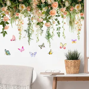 Detailed view of floral rose vine and butterfly wall stickers applied on white wall decor