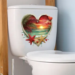 Detail of a heart-shaped beach sunset sticker on a white toilet tank, waterproof decor.