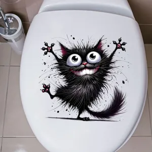 Detailansicht eines lustigen schwarzen Katzenaufklebers auf einem weißen Toilettendeckel