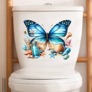 Detailed view of the 3D butterfly beach scene sticker applied on a white toilet tank