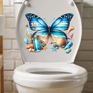 View of a decorative butterfly beach sticker applied on a white toilet lid inside a bathroom.