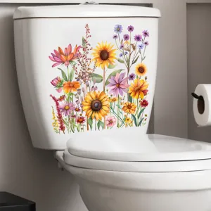 Aquarel zonnebloem sticker aangebracht op een wit toiletreservoir detail.