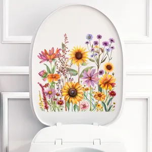 Gedetailleerd overzicht van een levendige zonnebloemsticker op een wit toiletdeksel