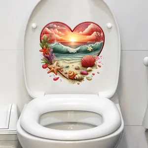 Vibrant heart-shaped beach sunset waterproof sticker detailed on a white toilet lid