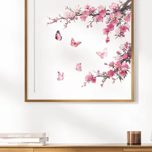 Detail view of pink cherry blossom wall stickers with butterflies in a modern home interior