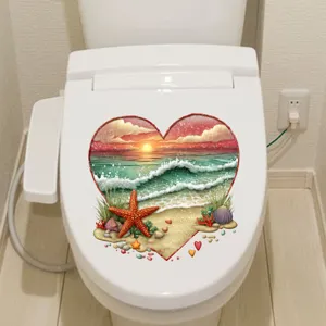 Heart-shaped beach sunset toilet seat decal sticker with starfish and ocean waves decor