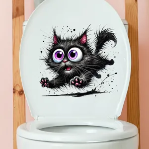 Detailansicht eines lustigen schwarzen Katzenaufklebers auf einem weißen Toilettendeckel