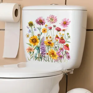 Detail van kleurrijke zonnebloem bloemensticker op wit toiletreservoir in badkamer
