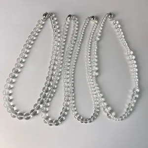 Set of transparent white crystal bead necklaces in various sizes with magnetic clasps