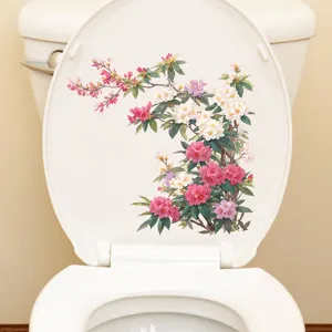 Detailed view of pink floral waterproof sticker applied to a white toilet seat cover