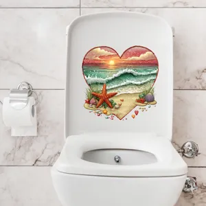 Heart-shaped beach sunset waterproof self-adhesive decal applied on a toilet lid.