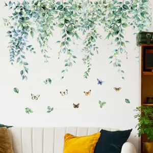Watercolor hanging green leaf vines and butterfly wall stickers applied in living room