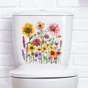 Close-up van kleurrijke, waterdichte zonnebloem- en wildbloemstickers op een toilet