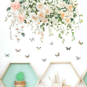 Detail view of floral wall decals featuring elegant roses and colorful butterflies