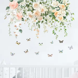 Detailed view of floral rose vine and butterfly wall stickers in a nursery