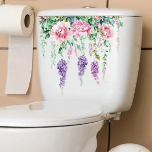 Waterproof floral vine wall sticker applied to a white toilet tank in a bathroom setting