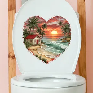 Detail view of heart-shaped beach sunset sticker applied on a white toilet lid