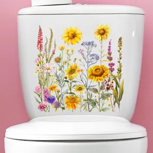 Gedetailleerd overzicht van zonnebloem en wilde bloemen stickers op een wit toiletreservoir
