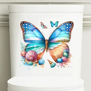 Close-up detail of butterfly toilet sticker with vibrant beach and seashell artwork