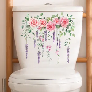 Watercolor pink roses and purple lavender floral decal applied to a white toilet lid